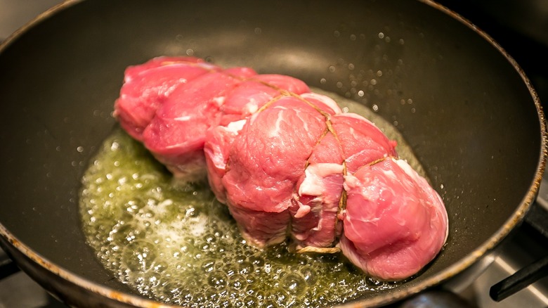 Searing beef on a pan