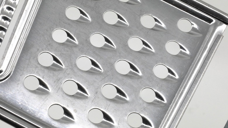 close-up of holes on grater