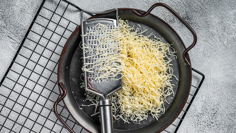 Parmesan cheese and grater