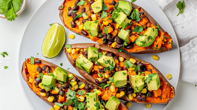 loaded sweet potato skins on white plate