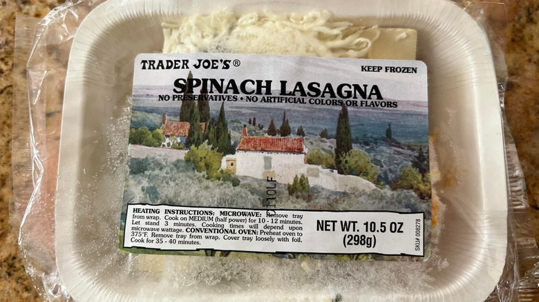 TJ's frozen spinach lasagna on marble countertop