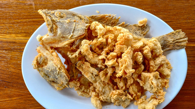 Deep-fried whole grouper on plate