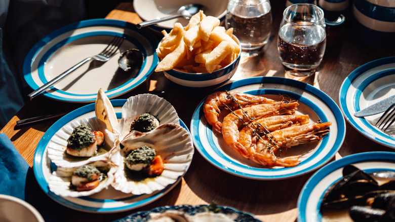 Dishes of various seafood on a table