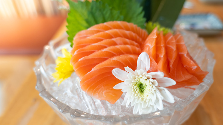 Sliced sashimi presented with flower