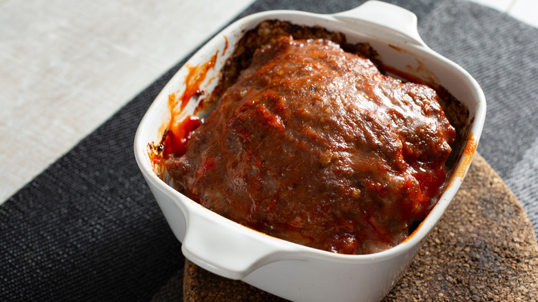 Cooked meatloaf in casserole dish