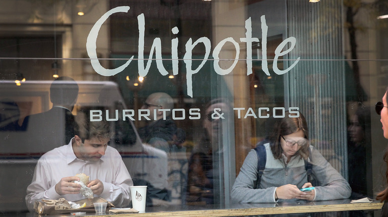 People eating in Chipotle