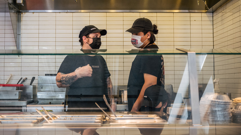 Chipotle staff talking