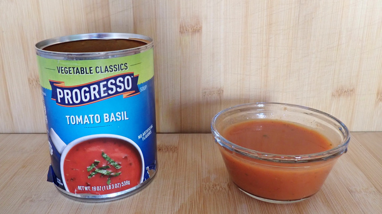 A can of Progresso tomato basil soup