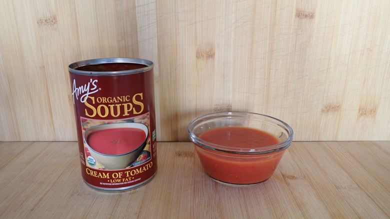 Can and bowl of Amy's cream of tomato soup