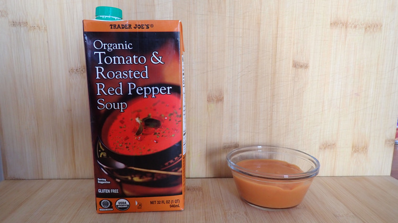 A carton of Trader Joe's tomato and roasted red pepper soup