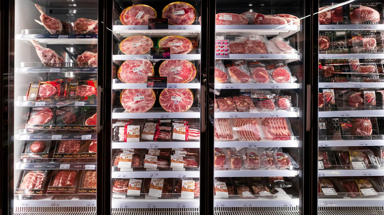 Steaks in freezer at store