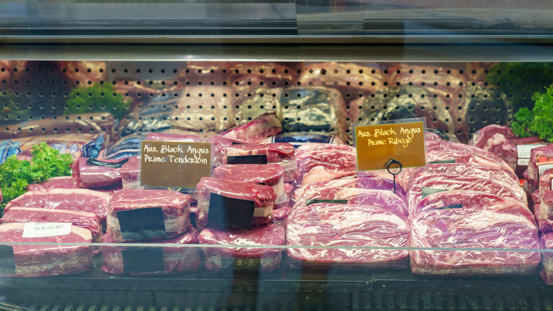 Steaks in butcher case