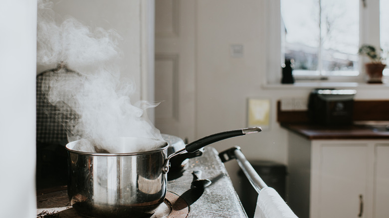 Steaming eggs in a pot