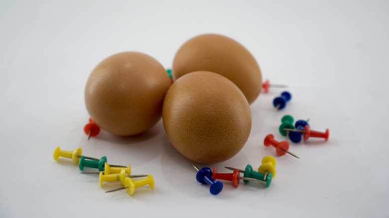 Thumbtacks and eggs