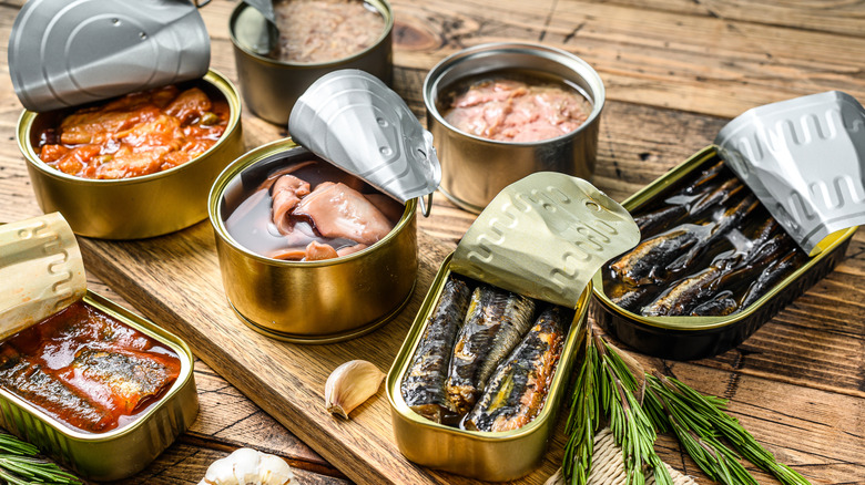 Cans of different seafood