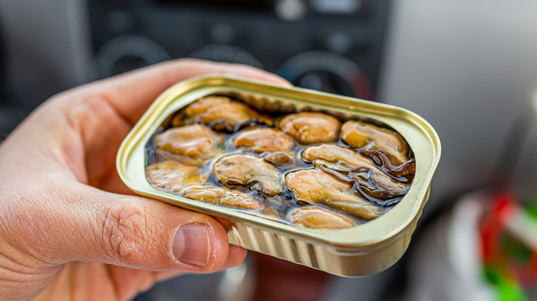 Open can of oysters