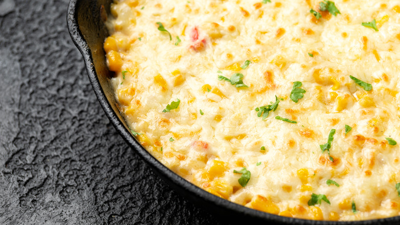 corn topped with cheese