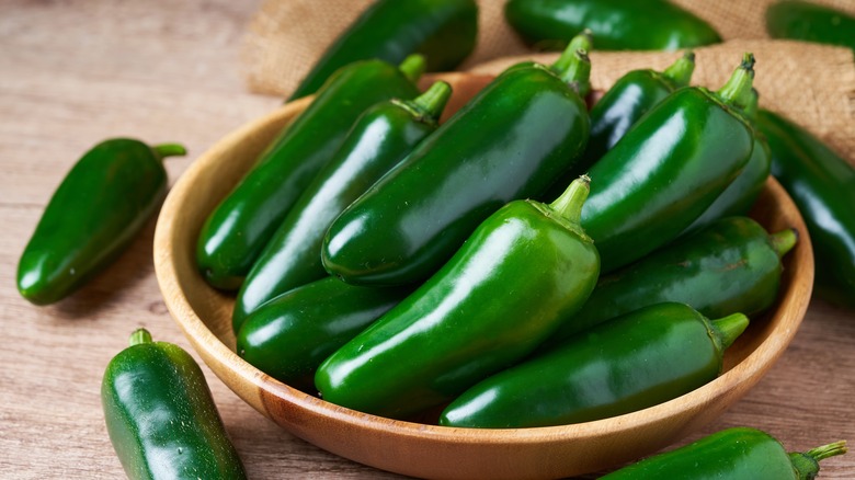 green jalapeños in a bowl