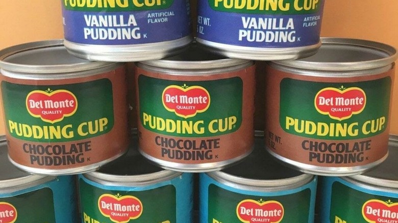 Cans of pudding in pyramid stack