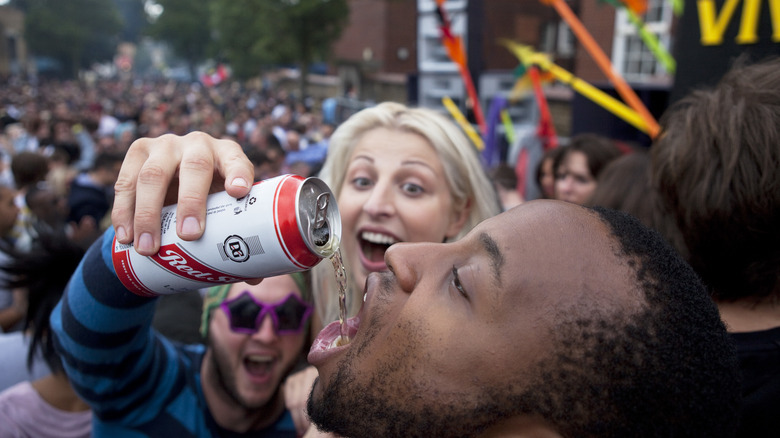 guy drinking Red Stripe