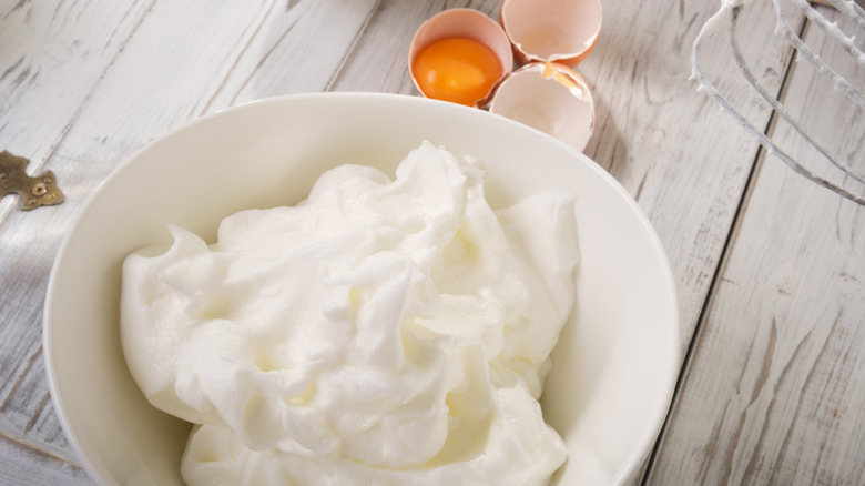 Whipped egg whites in bowl