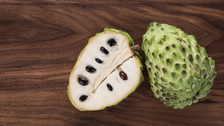 Custard apple sliced in half