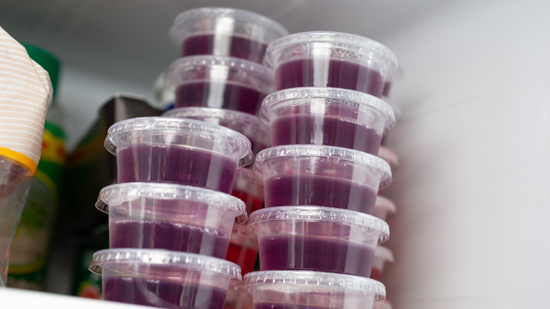 Jell-O containers stacked in fridge