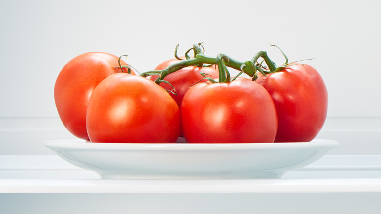 Tomatoes on a plate in the fridge