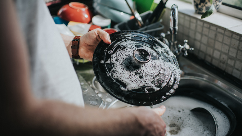 Soaking cast iron in soapy water