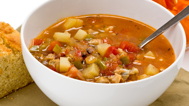 Bowl of Minorcan clam chowder with cornbread