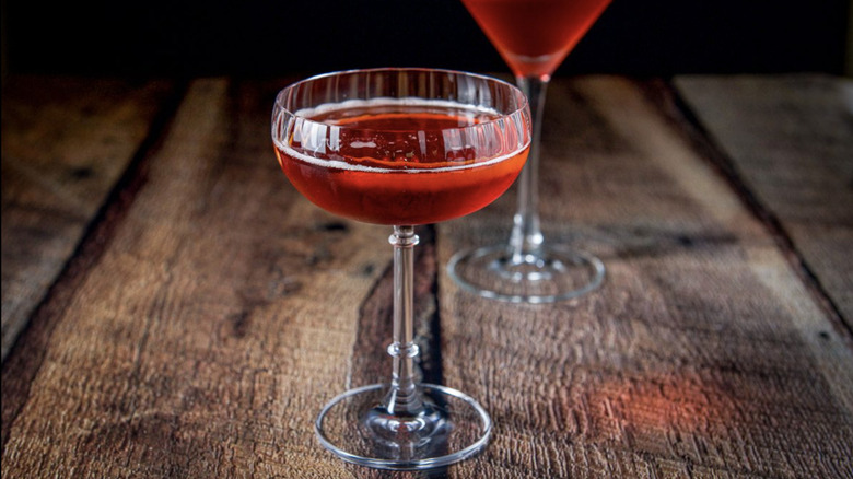 Boulevardier cocktail on wooden surface