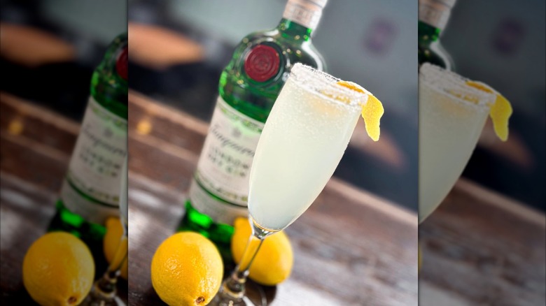 French 75 cocktail with gin bottle