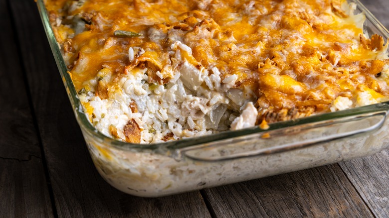 Cheesy chicken and rice in glass dish