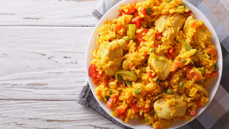 Rice with chicken and veggies in bowl