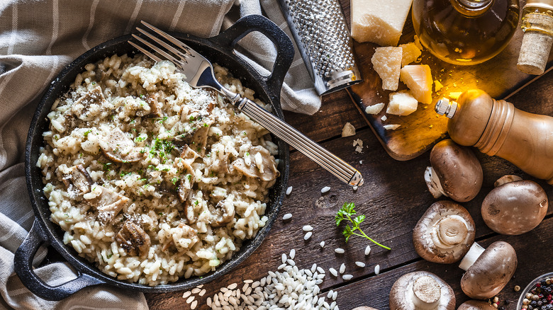 Mushrooms in rice in a skillet