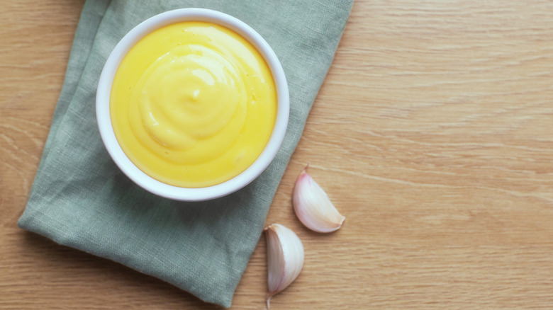 Aioli on the table with garlic