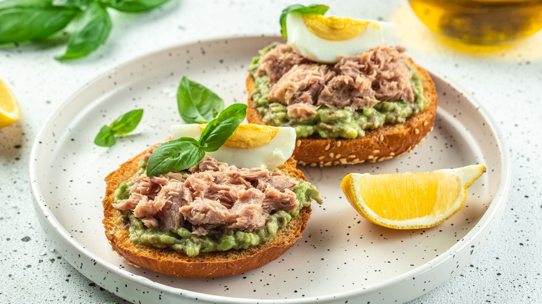 Tuna fish over avocado on bagel