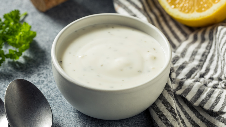 Ranch dressing in small white ramekin