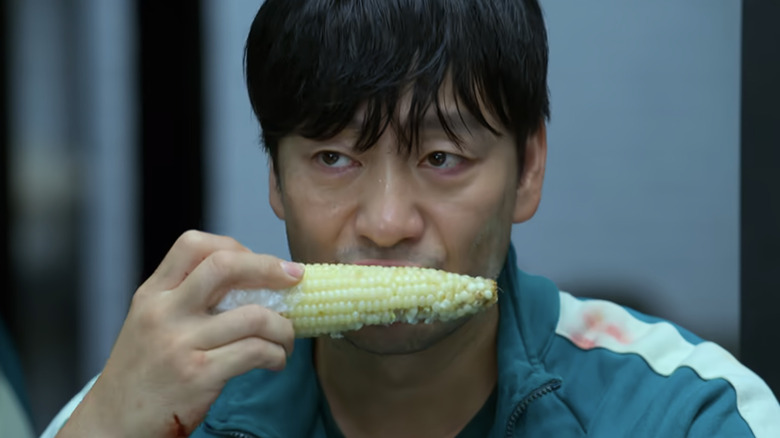 Sang Woo eats his corn on the cob