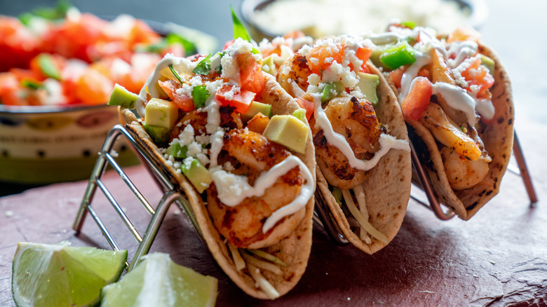 Shrimp tacos with avocado and a white sauce