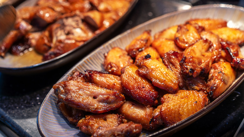 Two platters of chicken wings