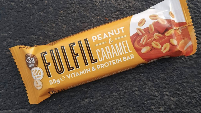 Fulfil protein bar on pavement