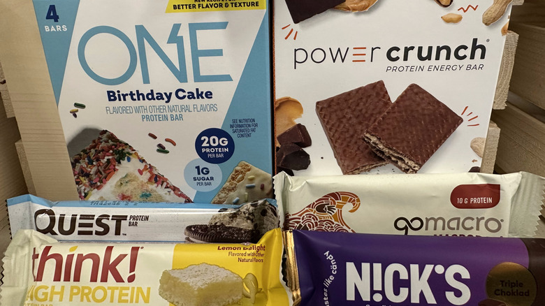 Varieties of protein bars in boxes and individuals