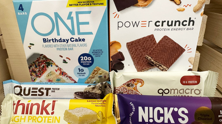 Varieties of protein bars in boxes and individuals