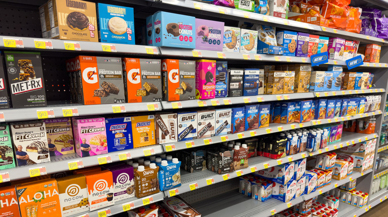 Boxes of protein bars on Walmart shelves