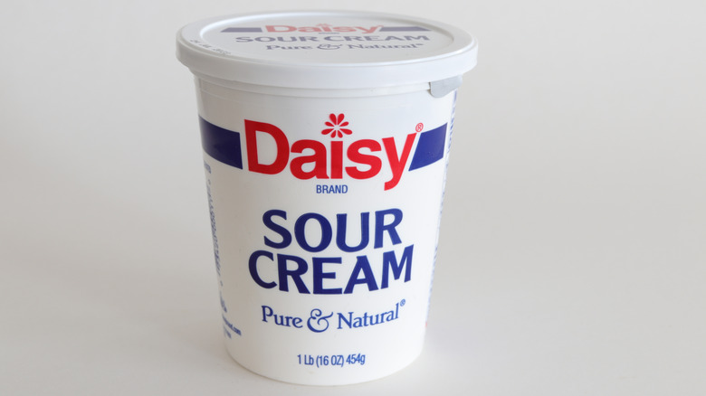 Carton of Daisy sour cream