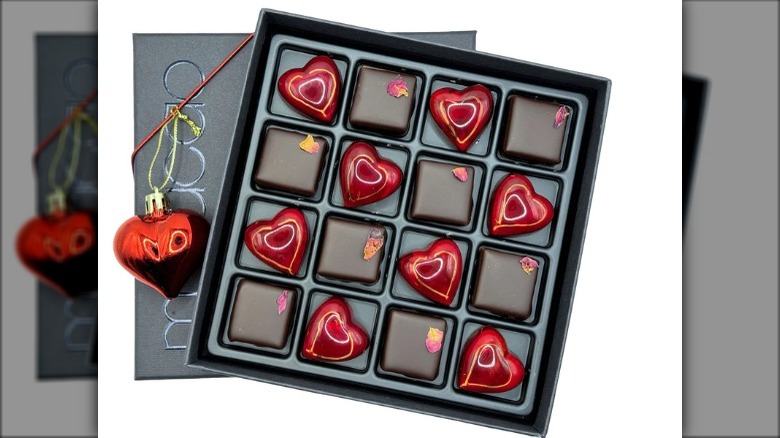 a  square-shaped box is filled with heart- and square-shaped chocolates