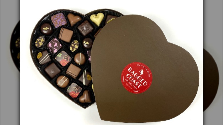 decorated truffles in brown heart-shaped box