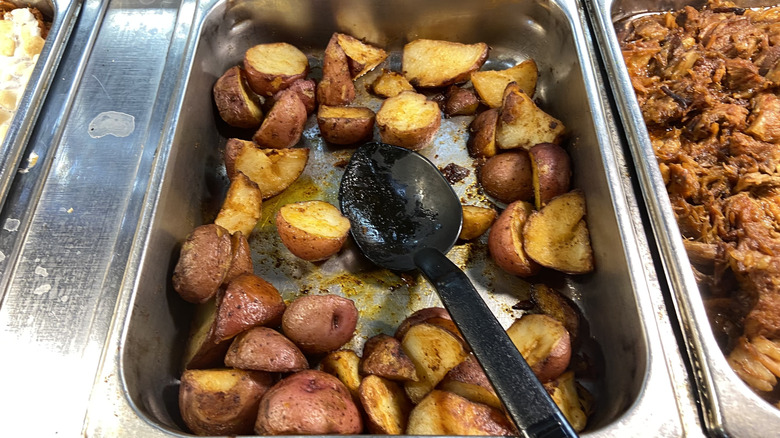 red potatoes in metal tray