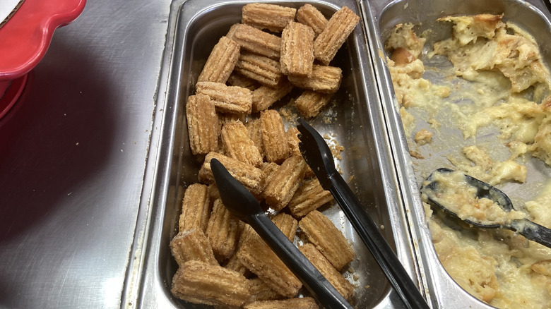 mini churros in metal tray